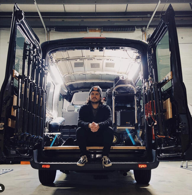 Posing inside the gear van. Photo by Eron Rawson, 2022.